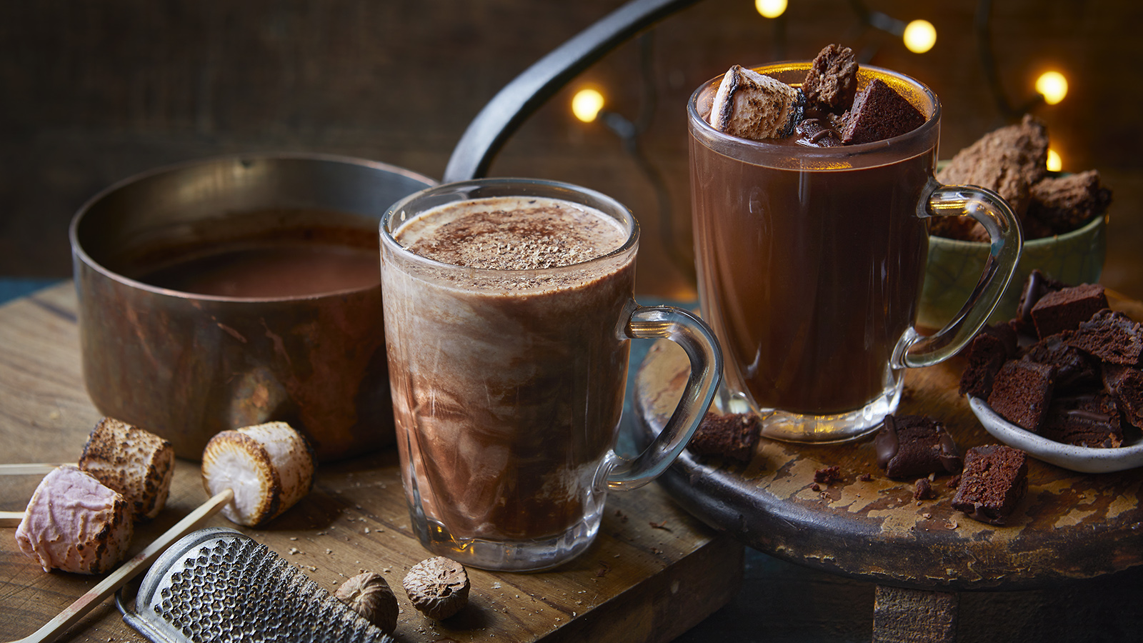 two cups filled with hot chocolate