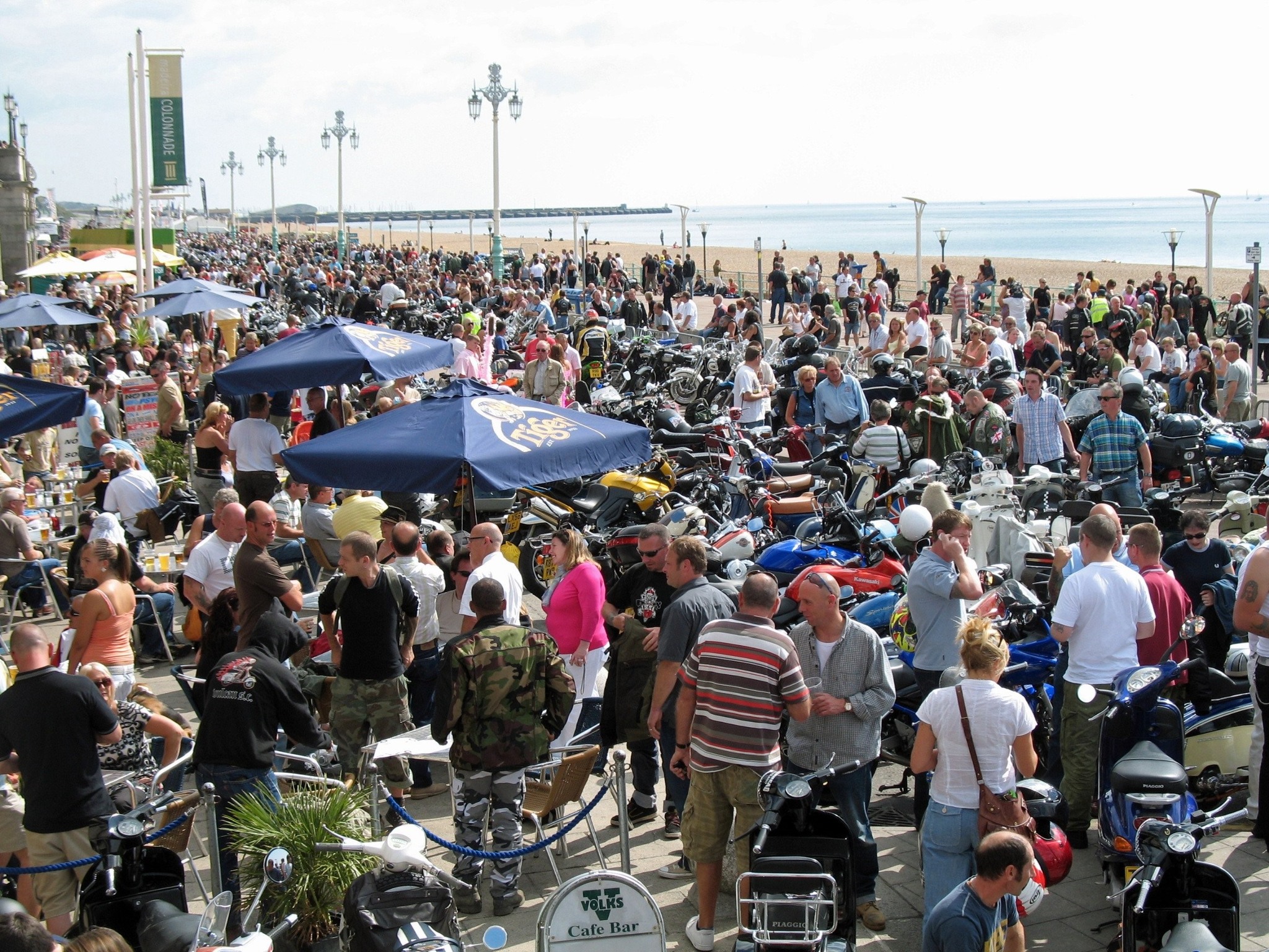 group of people gathered at Brighton seafront