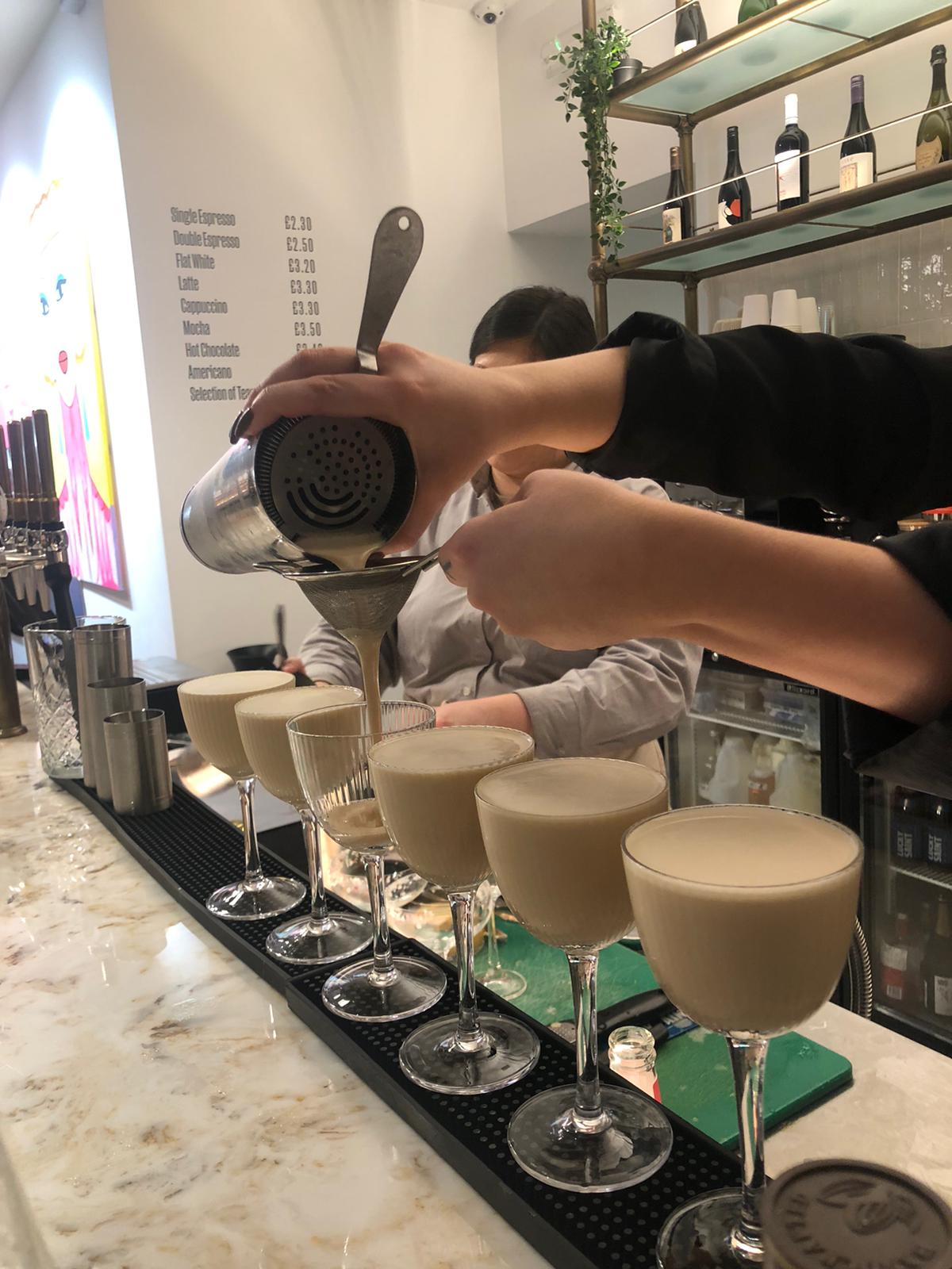 Cocktails being poured at Helm Art Gallery in Brighton during their guided tour