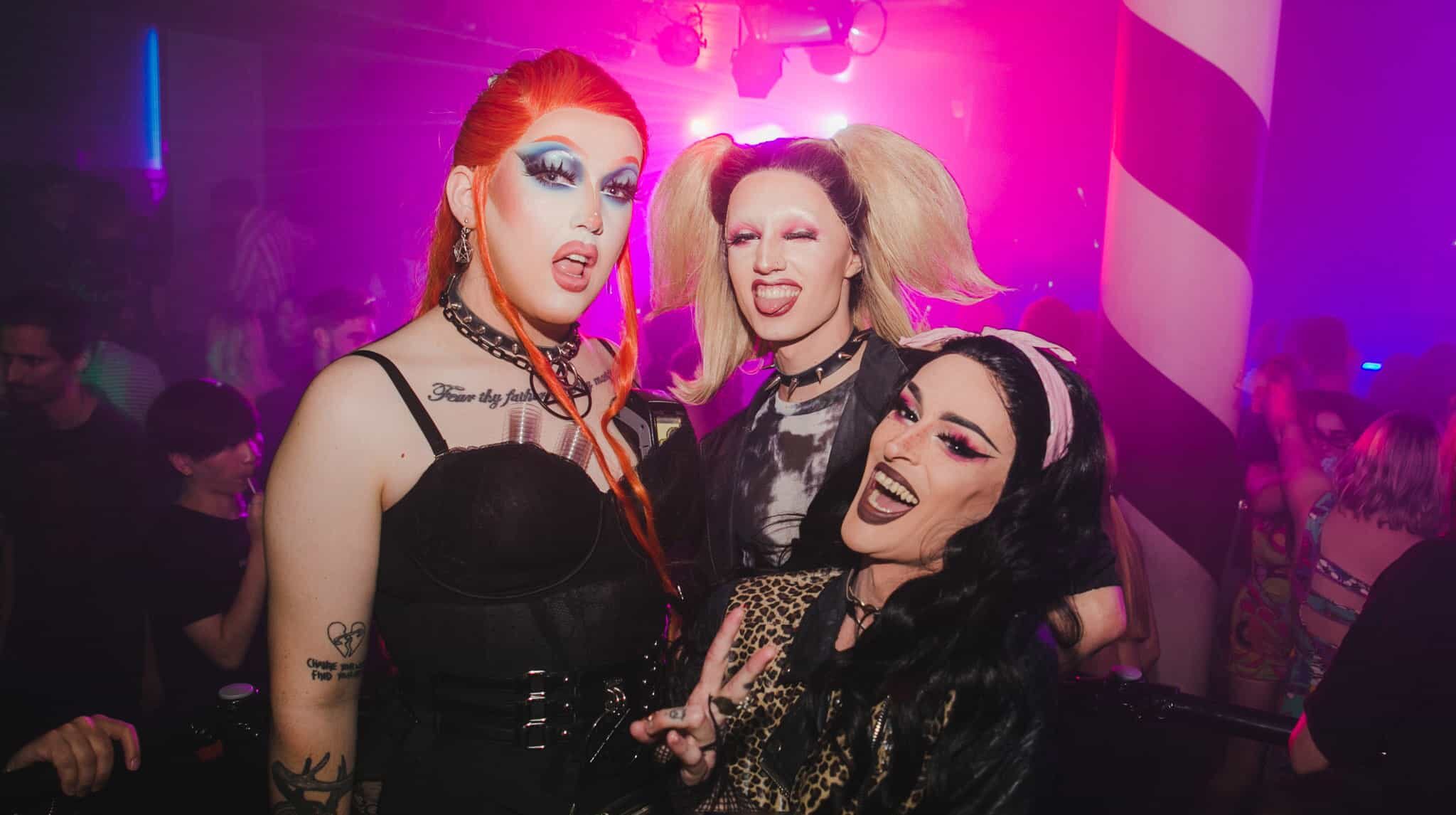 Three drag queens at one of the LGBTQ+ clubs in Brighton called Revenge